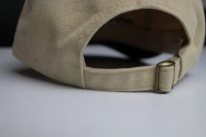 Brass buckle clasp on custom hat