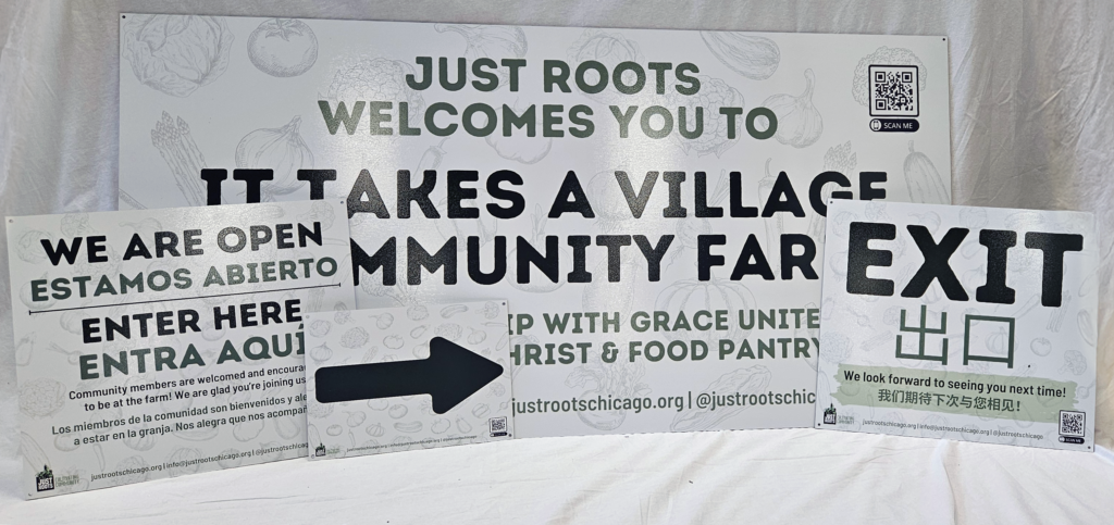 group photo of just roots aluminum composite signs featuring inforamtional and wayfinding signs 