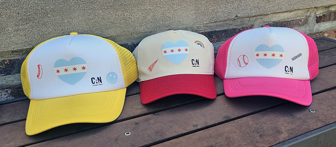 Colorway lineup of yellow, red and pink trucker hats