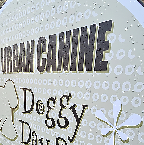 PVC Sign with rain droplets demonstrating weather resistance