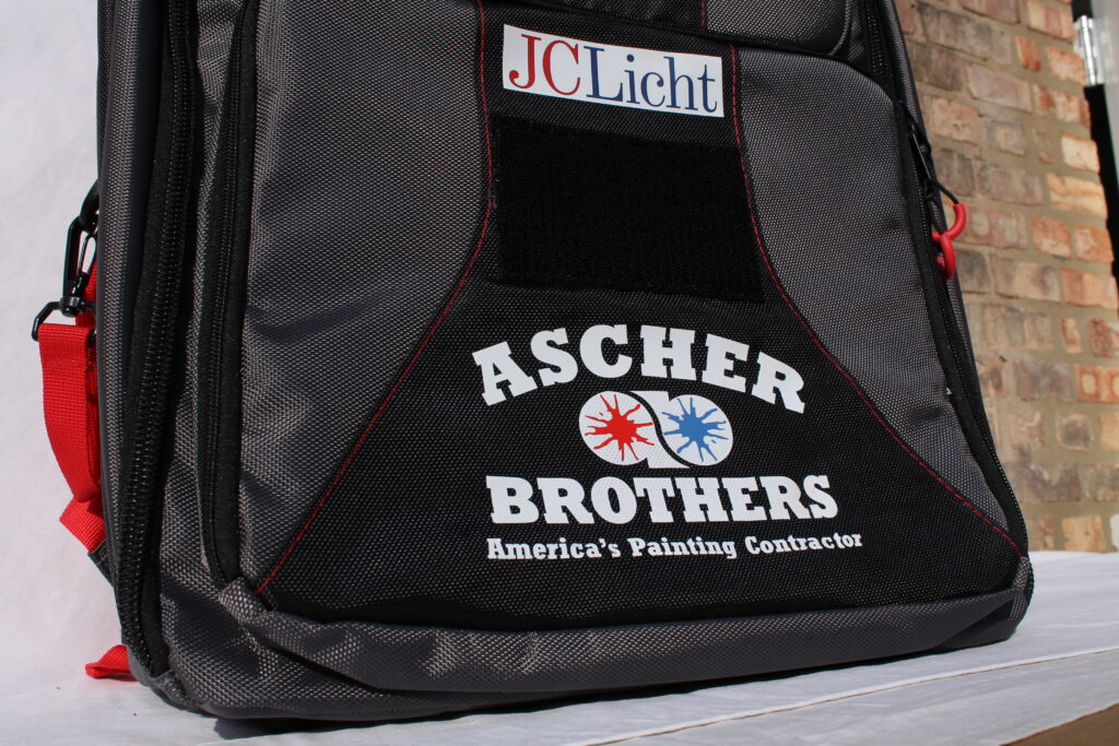 Close up of Ascher Brothers logo on awooster customized tool bags for painters